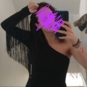 Asymmetrical bodysuit with a fringe sleeve
